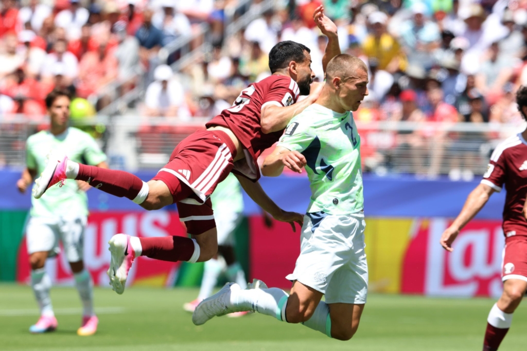 Qatar Claims Historic First World Cup Point with Stoppage-Time Stunner Against Switzerland
